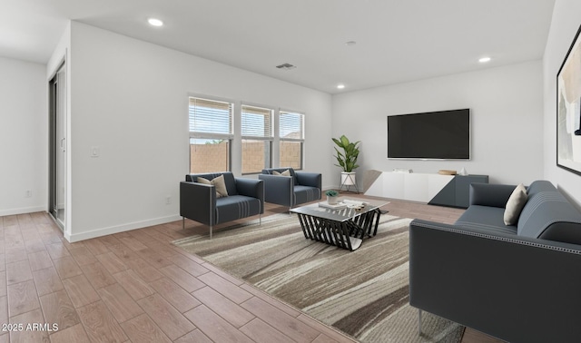 7420 S 76th Ln, Laveen, AZ 85339 - living room featuring wood finished floors, recessed lighting, and baseboards