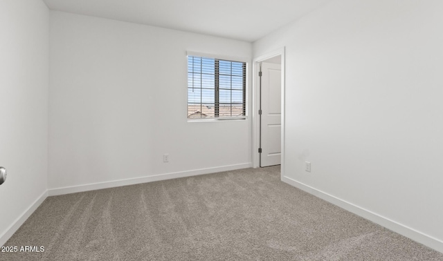 7420 S 76th Ln, Laveen, AZ 85339 - unfurnished room with carpet flooring and baseboards