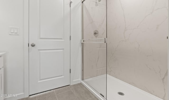 7420 S 76th Ln, Laveen, AZ 85339 - bathroom with a marble finish shower and tile patterned flooring