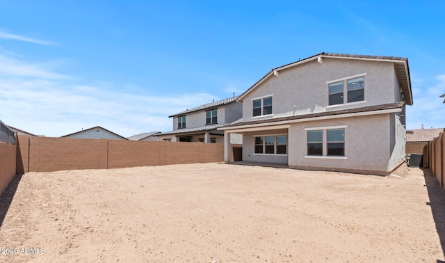 7420 S 76th Ln, Laveen, AZ 85339 - rear view of property with a fenced backyard, stucco siding, and cooling unit