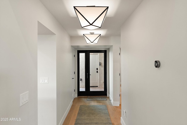 entryway with light hardwood / wood-style flooring