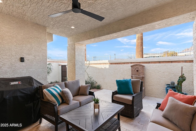 view of patio featuring area for grilling, an outdoor hangout area, and ceiling fan