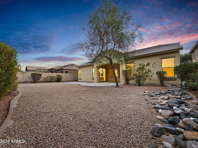 view of front of home featuring a patio area