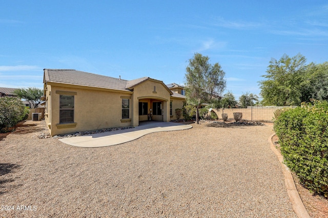 rear view of property with a patio