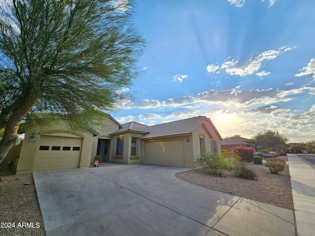 view of front of property featuring a garage