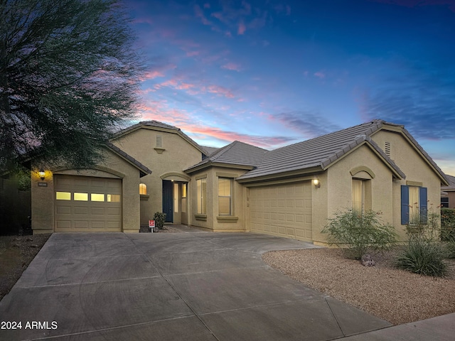 view of front of property featuring a garage