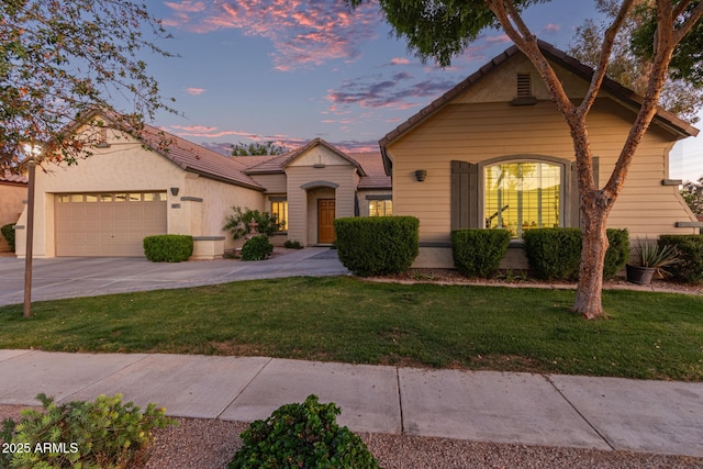 2045 E San Carlos Pl, Chandler, AZ 85249 - view of front of property featuring driveway, a garage, and a front lawn