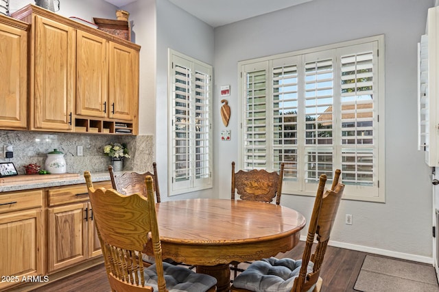 2045 E San Carlos Pl, Chandler, AZ 85249 - dining space with dark wood-style floors and baseboards