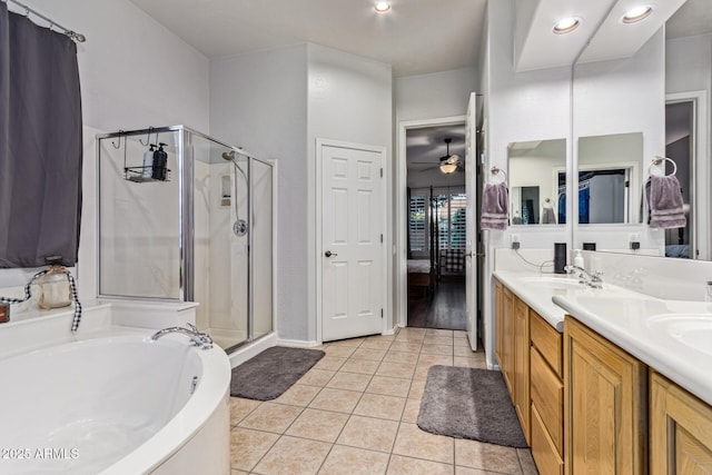 2045 E San Carlos Pl, Chandler, AZ 85249 - bathroom featuring connected bathroom, a shower stall, a bath, tile patterned flooring, and double vanity