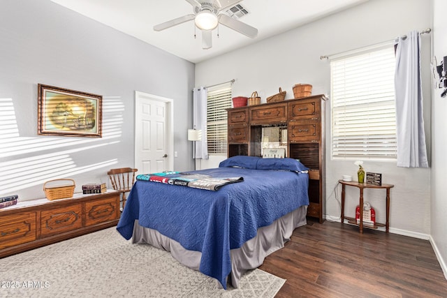 2045 E San Carlos Pl, Chandler, AZ 85249 - bedroom with wood finished floors, baseboards, and a ceiling fan