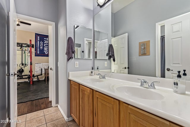 2045 E San Carlos Pl, Chandler, AZ 85249 - full bath with tile patterned flooring, double vanity, ceiling fan, and baseboards