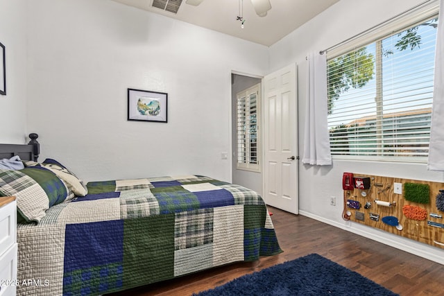 2045 E San Carlos Pl, Chandler, AZ 85249 - bedroom with wood finished floors, baseboards, and ceiling fan