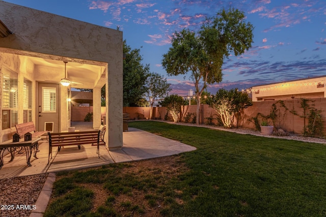 2045 E San Carlos Pl, Chandler, AZ 85249 - yard at dusk with a patio
