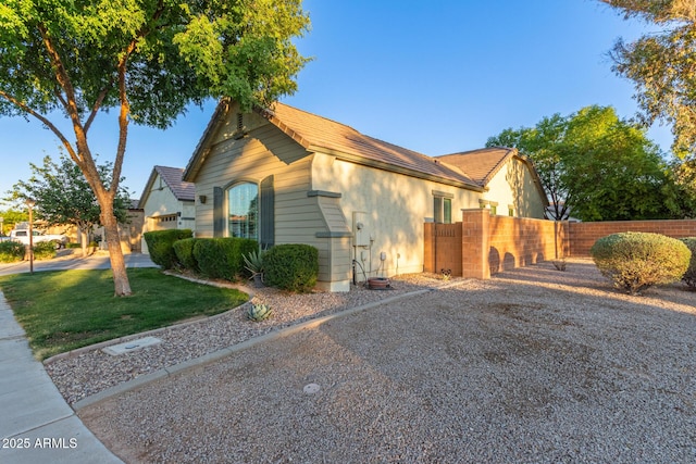 2045 E San Carlos Pl, Chandler, AZ 85249 - view of home's exterior featuring a gate
