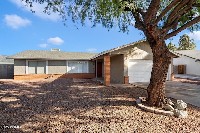 single story home featuring a garage