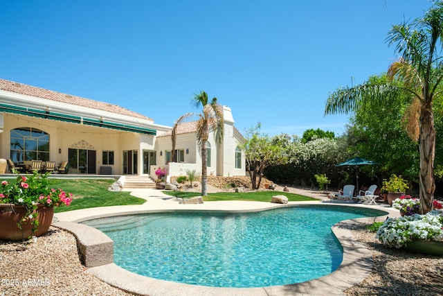 pool with a patio area