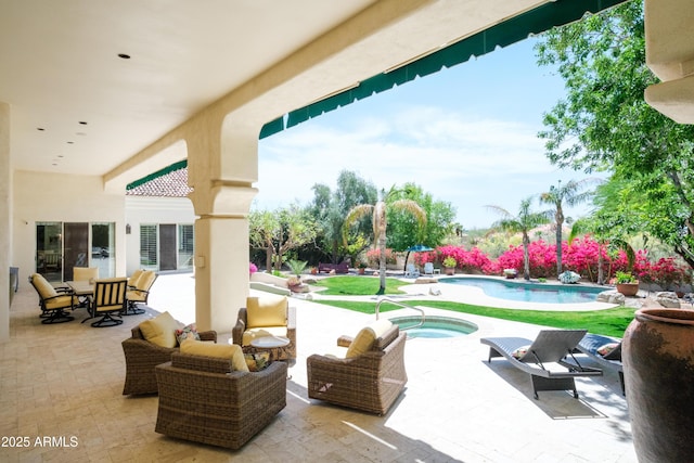 view of patio / terrace featuring an in ground hot tub and an outdoor pool