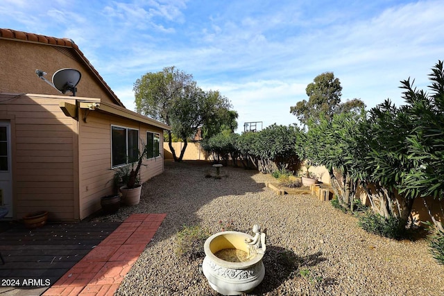 view of yard with a deck