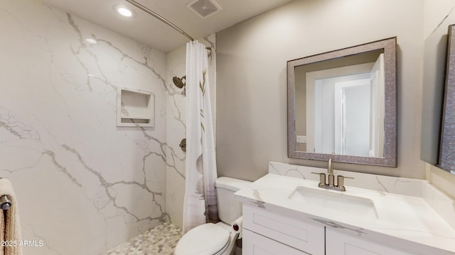 25555 N Windy Walk Dr Unit 64, Scottsdale, AZ 85255 - bathroom featuring a marble finish shower, vanity, toilet, and recessed lighting