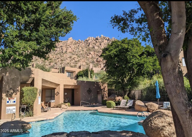25555 N Windy Walk Dr Unit 64, Scottsdale, AZ 85255 - community pool featuring fence and a patio