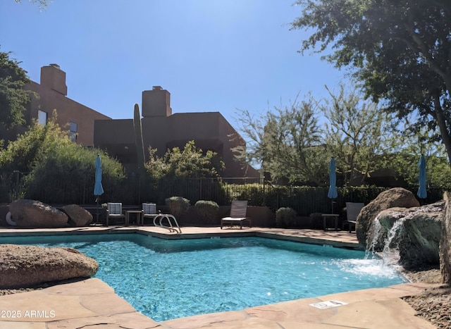 25555 N Windy Walk Dr Unit 64, Scottsdale, AZ 85255 - view of pool featuring fence and a patio