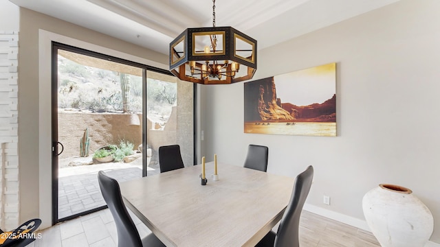 25555 N Windy Walk Dr Unit 64, Scottsdale, AZ 85255 - dining area with a chandelier