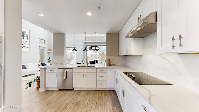 25555 N Windy Walk Dr Unit 64, Scottsdale, AZ 85255 - kitchen featuring under cabinet range hood, dishwasher, a sink, a peninsula, and black electric cooktop