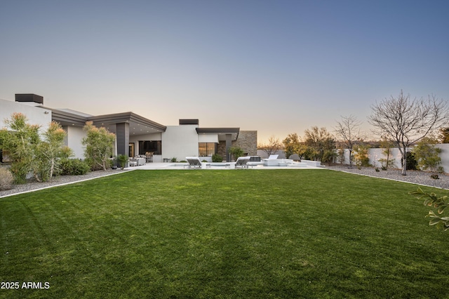 exterior space featuring a yard and a patio area