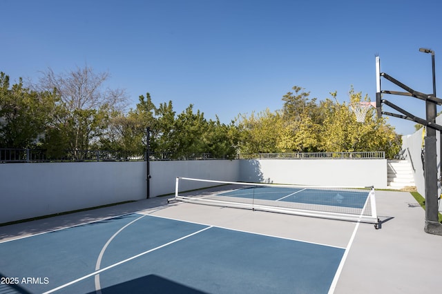 view of sport court with tennis court