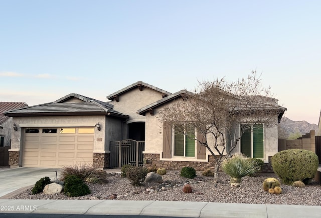 view of front of home with a garage