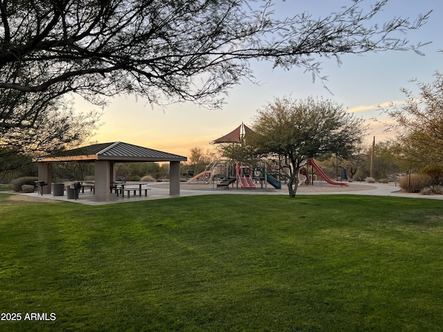 surrounding community featuring a playground, a lawn, and a gazebo