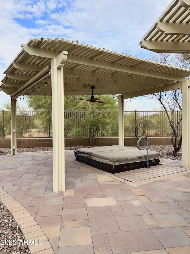 view of patio / terrace featuring ceiling fan