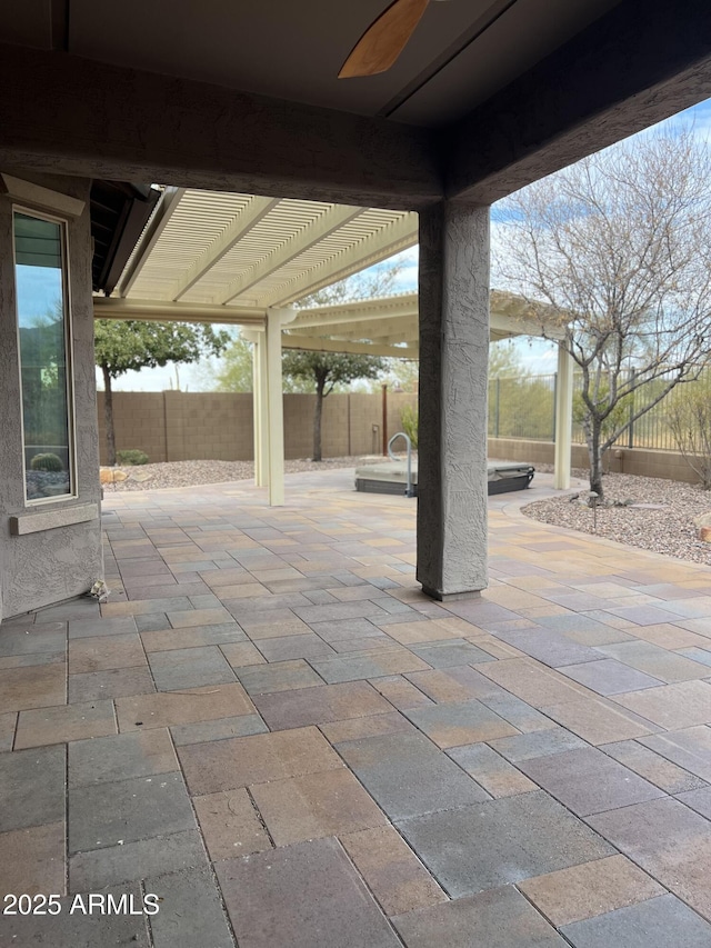 view of patio with ceiling fan