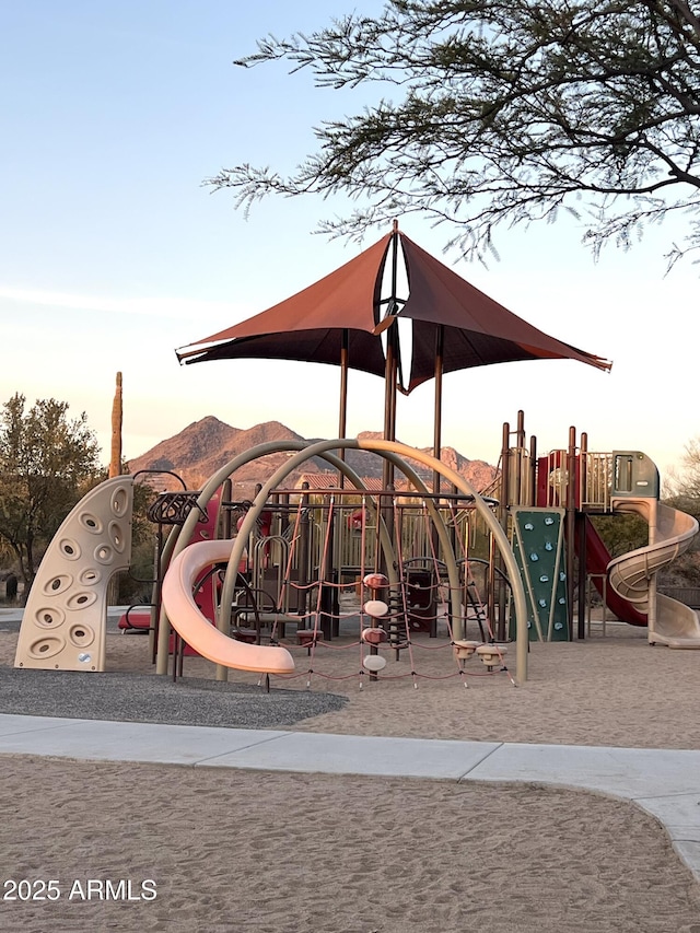 view of playground at dusk