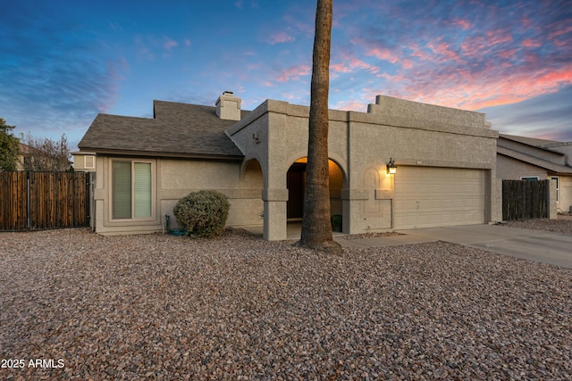 view of front of home featuring a garage