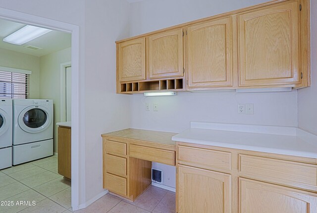 3928 N 151st Ave, Goodyear, AZ 85395 - washroom featuring laundry area, washing machine and dryer, and light tile patterned flooring