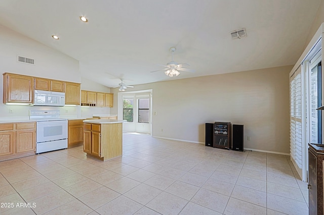 3928 N 151st Ave, Goodyear, AZ 85395 - kitchen featuring visible vents, lofted ceiling, white appliances, light countertops, and light tile patterned floors