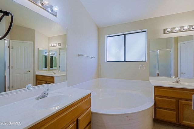 3928 N 151st Ave, Goodyear, AZ 85395 - bathroom with a sink, a shower stall, a bath, and two vanities