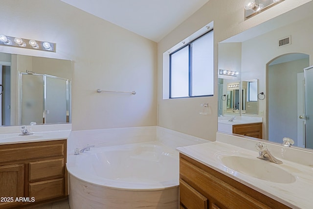 3928 N 151st Ave, Goodyear, AZ 85395 - bathroom featuring a sink, a shower stall, a bath, and visible vents