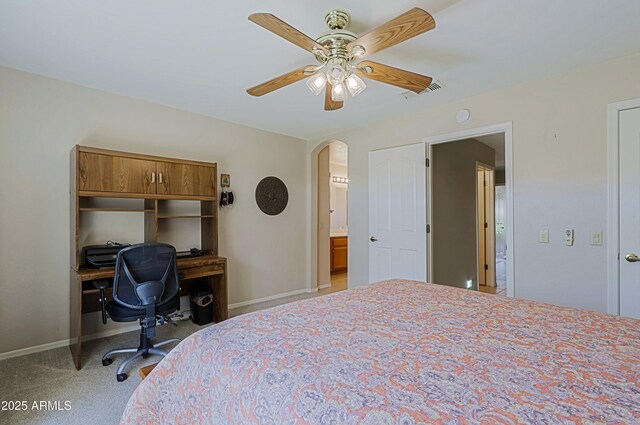 3928 N 151st Ave, Goodyear, AZ 85395 - bedroom with ceiling fan, light colored carpet, arched walkways, baseboards, and visible vents