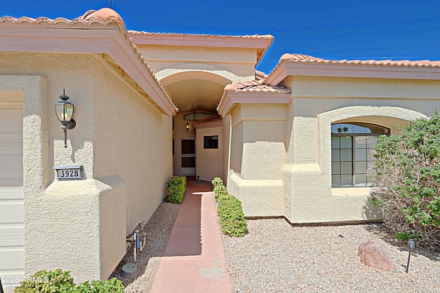 3928 N 151st Ave, Goodyear, AZ 85395 - property entrance with stucco siding and a tile roof