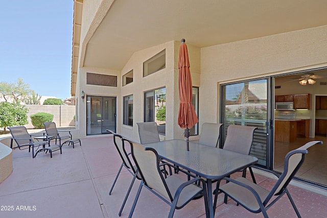 3928 N 151st Ave, Goodyear, AZ 85395 - view of patio / terrace with fence and outdoor dining area