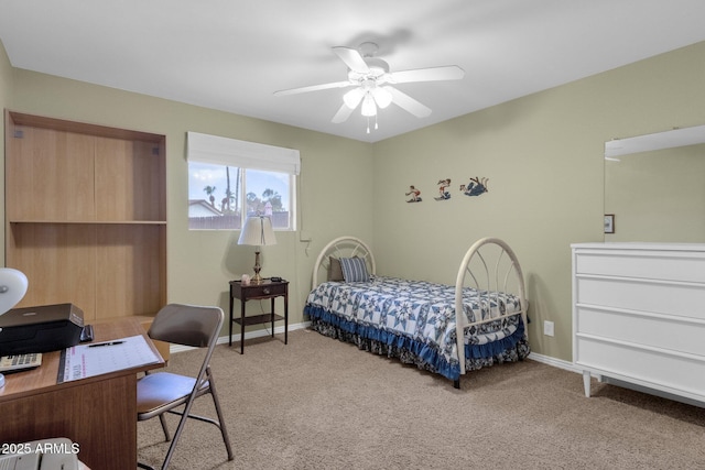 bedroom with light carpet, a ceiling fan, and baseboards