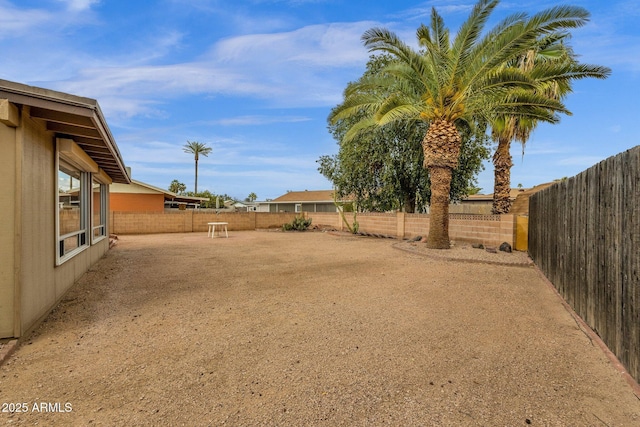 view of yard with a fenced backyard