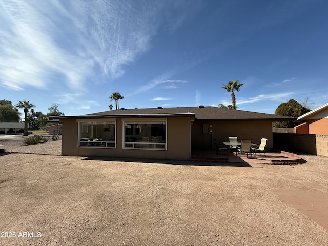 rear view of house with a patio area