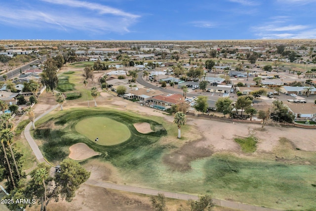 bird's eye view featuring view of golf course and a residential view