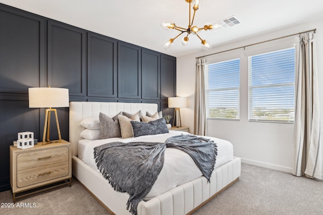 bedroom with a chandelier, visible vents, light carpet, and baseboards