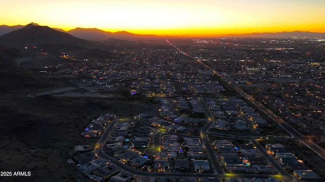 aerial view at dusk with a mountain view