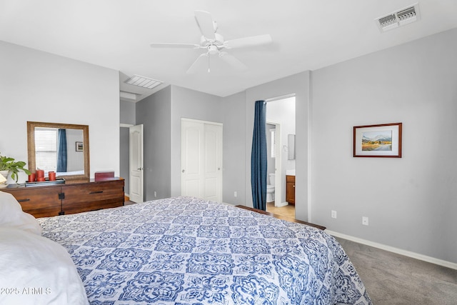 bedroom featuring a closet, baseboards, carpet flooring, and visible vents