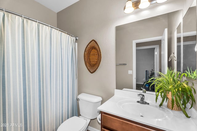 full bath with vanity, a shower with curtain, and toilet